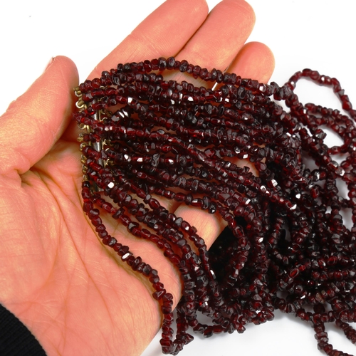 754 - A 10-strand garnet bead necklace, length 44cm, 120g