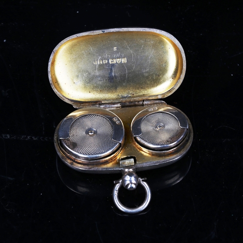 763 - An Edwardian silver sovereign and half sovereign case, plain oval form, by E J Trevitt & Sons Ltd, h... 