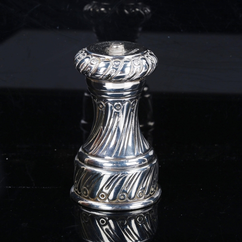 766 - An Edwardian silver peppermill, allover fluted decoration, by Joseph Braham, hallmarks London 1903, ... 