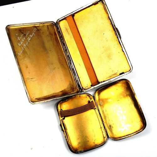 772 - 2 silver cigarette cases, 8oz total (2)