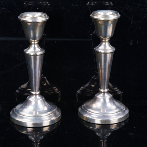 774 - A pair of Elizabeth II silver table candlesticks, maker's marks JMA, hallmarks Birmingham 1972, heig... 