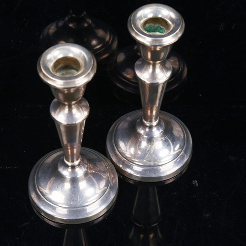 774 - A pair of Elizabeth II silver table candlesticks, maker's marks JMA, hallmarks Birmingham 1972, heig... 