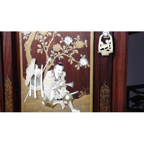 1150 - A superb quality Japanese Shibayama cabinet, Meiji Period circa late 19th century, the carved and pi... 