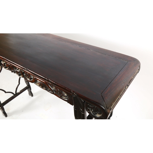 1151 - A Chinese 19th century rosewood altar table, with grapevine carved and pierced frieze on carved supp... 