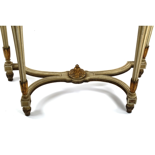 1243 - A French marble-topped console table, early 20th century, with shaped marble top on carved painted a... 