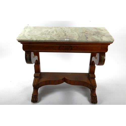 1251 - A 19th century mahogany marble-topped console table, with ogee-shaped frieze drawer, shaped end supp... 