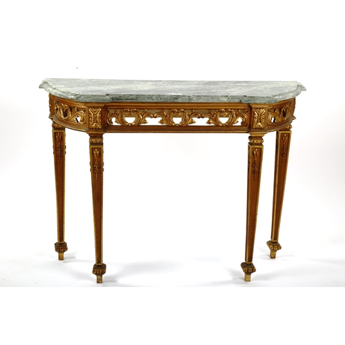 1252 - An ornate carved giltwood console table, probably mid-20th century, with green marble top and carved... 