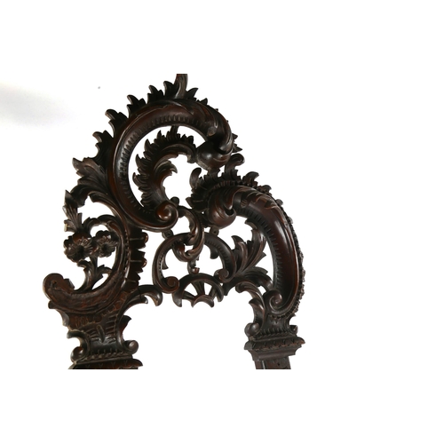 1413 - A 19th century mahogany display easel, with carved acanthus leaf decoration, height 2m