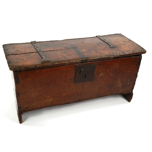 1416 - A 17th/18th century oak coffer of plank construction, with iron hinges, length 95cm