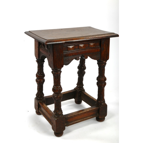 1417 - An Antique oak joint stool with unusual acanthus carved baluster supports, 46cm x 29cm, height 56cm