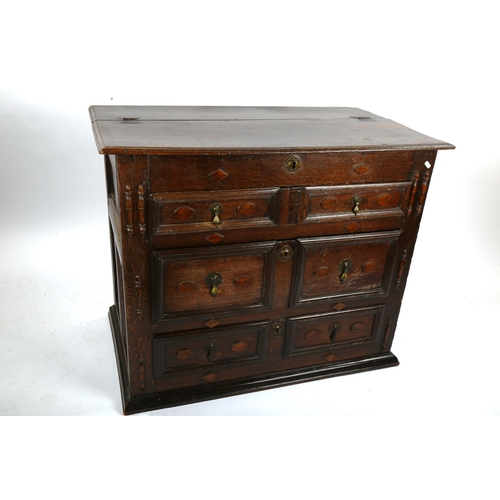 1418 - A 17th/18th century joined oak chest of drawers, with rising top, 2 short and 2 long drawers below w... 