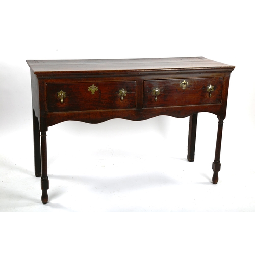 1419 - An 18th century oak 2-drawer dresser base of small size, with turned legs, length 127cm, depth 44cm,... 