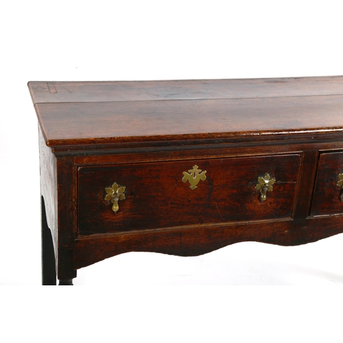 1419 - An 18th century oak 2-drawer dresser base of small size, with turned legs, length 127cm, depth 44cm,... 