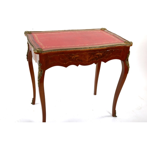 1422 - A French marquetry inlaid kingwood writing table, circa 1900, with serpentine-shaped surround, inset... 