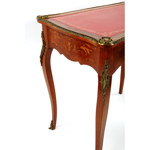 1422 - A French marquetry inlaid kingwood writing table, circa 1900, with serpentine-shaped surround, inset... 