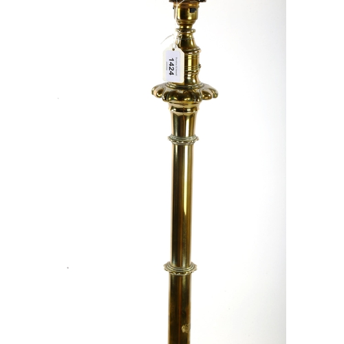 1424 - A good quality Victorian brass standard lamp, on heavy quadruple base, converted to electric