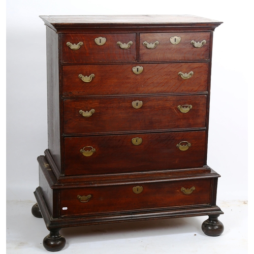 1537 - An early 18th century oak chest on stand, width 90cm, height 118cm