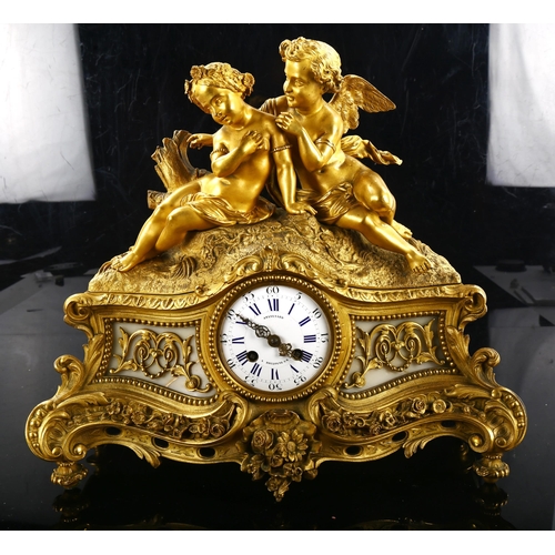 79S - A 19th century Rococo French gilt-bronze and marble figural 8-day mantel clock, by Stevenard of Boul... 