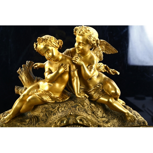 79S - A 19th century Rococo French gilt-bronze and marble figural 8-day mantel clock, by Stevenard of Boul... 