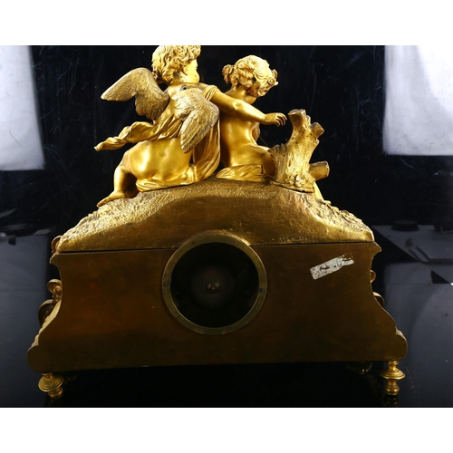 79S - A 19th century Rococo French gilt-bronze and marble figural 8-day mantel clock, by Stevenard of Boul... 