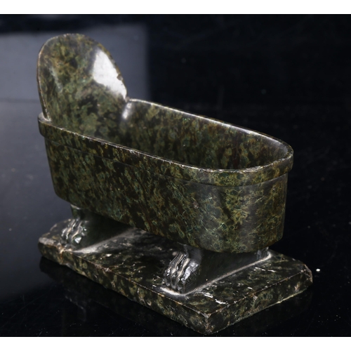 1001 - A Grand Tour or earlier carved serpentine Roman model bath with clawed feet, length 15cm