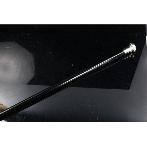 1304 - An ebony silver topped walking cane, hallmarked 1923, length 92cm