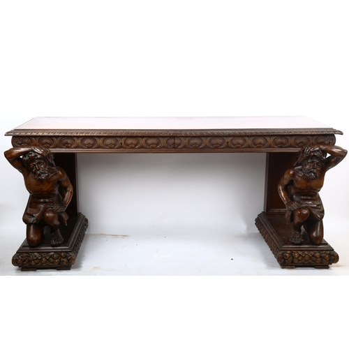 1238 - An impressive 19th century walnut hall/serving table, the top having a leaf carved edge with 2 carve... 