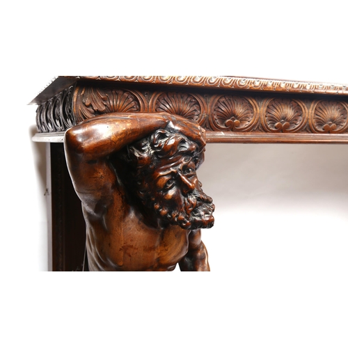 1238 - An impressive 19th century walnut hall/serving table, the top having a leaf carved edge with 2 carve... 