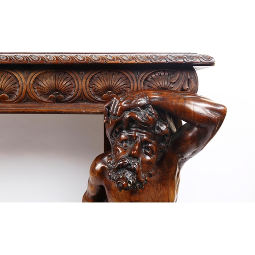 1238 - An impressive 19th century walnut hall/serving table, the top having a leaf carved edge with 2 carve... 