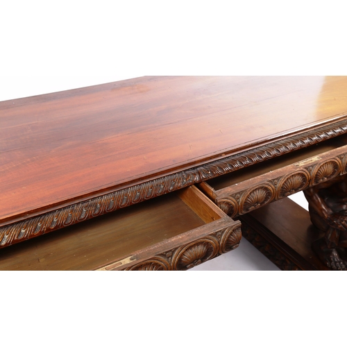 1238 - An impressive 19th century walnut hall/serving table, the top having a leaf carved edge with 2 carve... 