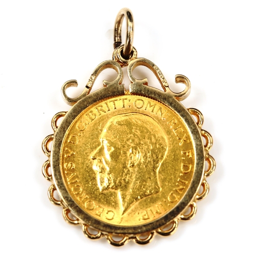 119 - A George V 1929 gold full sovereign coin, South Africa Mint, in 9ct gold pendant mount, 11.3g