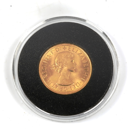 136 - An Elizabeth II 1957 Gillick gold uncirculated full sovereign coin, boxed with certificate of authen... 