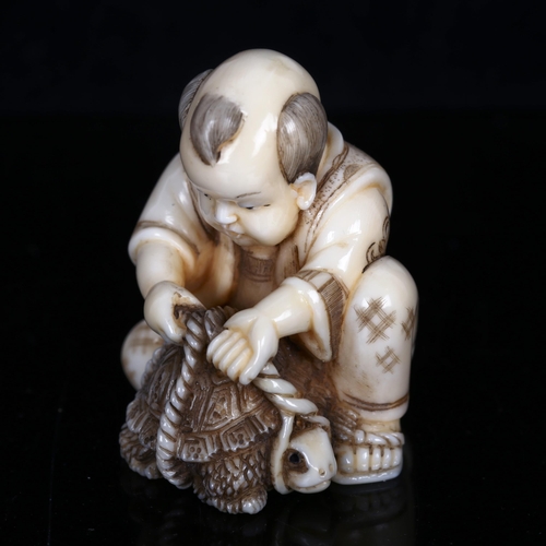 1526 - A Japanese ivory netsuke, tortoise catcher, signed, height 4cm