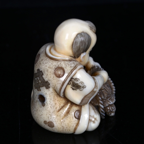 1526 - A Japanese ivory netsuke, tortoise catcher, signed, height 4cm