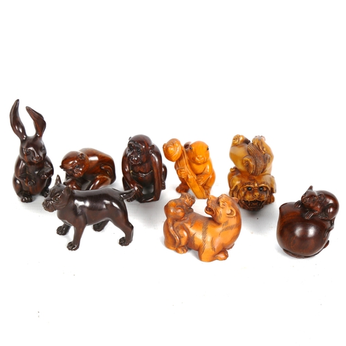 1527 - A collection of Japanese carved wood netsuke (8)