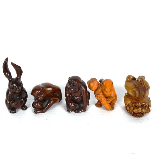 1527 - A collection of Japanese carved wood netsuke (8)