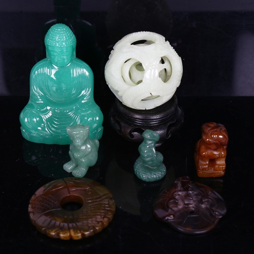 1533 - A collection of jade and hardstone carvings, jade puzzle ball etc