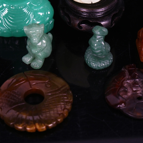 1533 - A collection of jade and hardstone carvings, jade puzzle ball etc