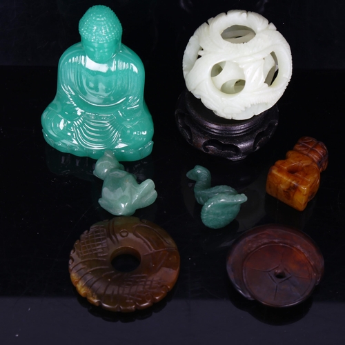 1533 - A collection of jade and hardstone carvings, jade puzzle ball etc