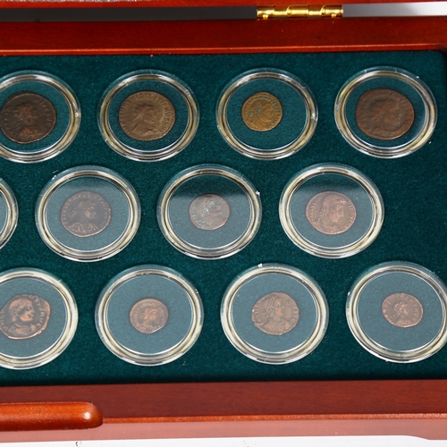 1534 - A collection of Roman bronze coins depicting 20 Emperors, 3rd and 4th century AD, in display case