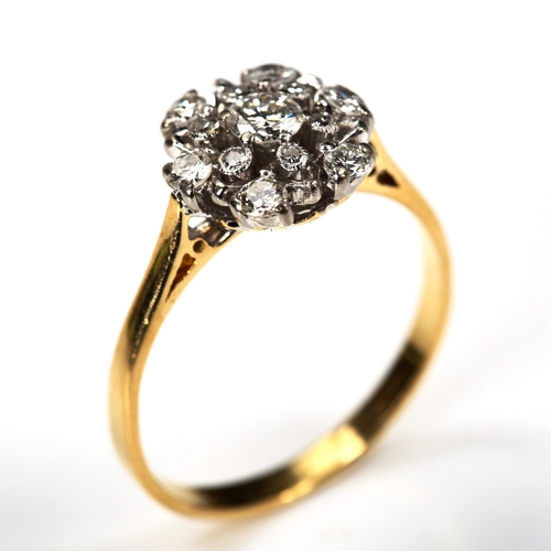 185 - An 18ct gold diamond cluster flowerhead ring, set with modern round brilliant and single-cut diamond... 