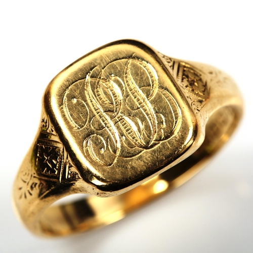 187 - A large 18ct gold signet ring, with engraved shoulders, maker's marks AC Co, hallmarks Birmingham 19... 