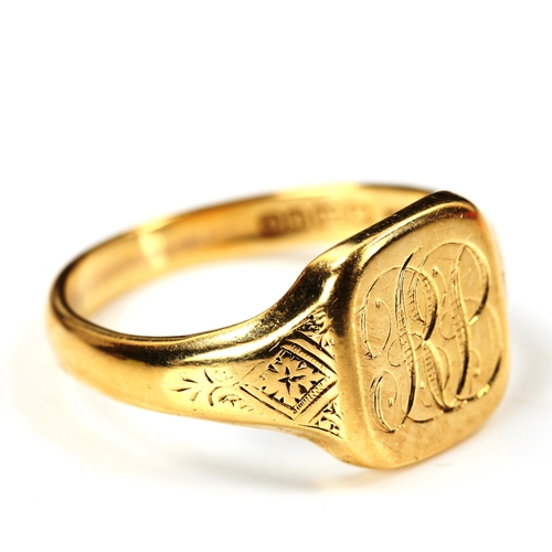 187 - A large 18ct gold signet ring, with engraved shoulders, maker's marks AC Co, hallmarks Birmingham 19... 