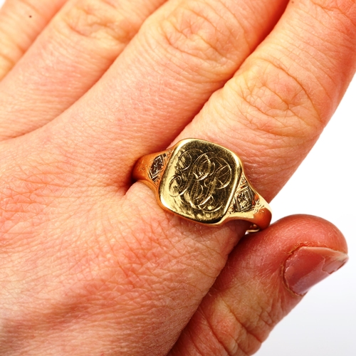 187 - A large 18ct gold signet ring, with engraved shoulders, maker's marks AC Co, hallmarks Birmingham 19... 