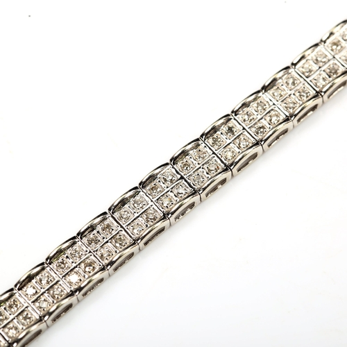 188 - A modern 9ct white gold double-lined diamond tennis bracelet, set with single-cut diamonds, total di... 