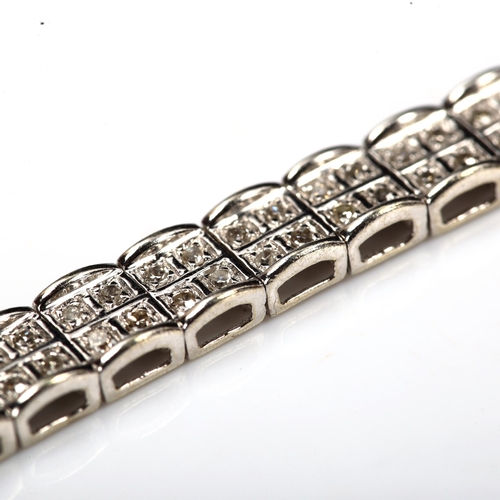 188 - A modern 9ct white gold double-lined diamond tennis bracelet, set with single-cut diamonds, total di... 