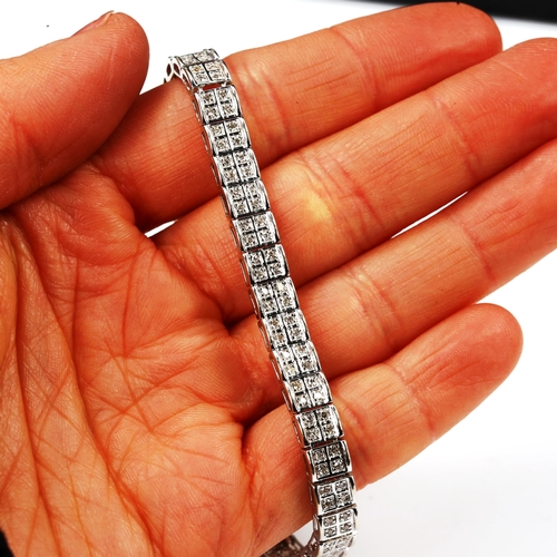 188 - A modern 9ct white gold double-lined diamond tennis bracelet, set with single-cut diamonds, total di... 