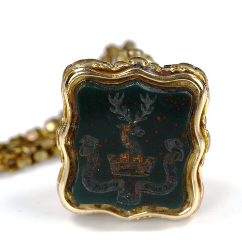 189 - An Antique gilt-metal bloodstone seal fob, on gold plated popcorn link chain, seal with stag head an... 