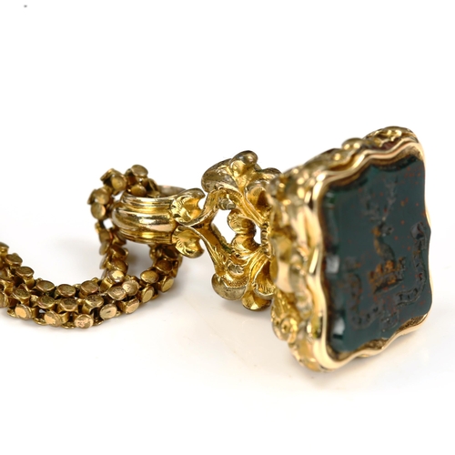 189 - An Antique gilt-metal bloodstone seal fob, on gold plated popcorn link chain, seal with stag head an... 