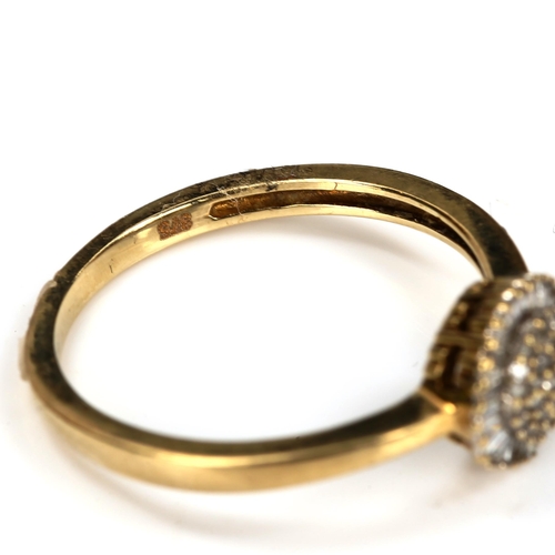 193 - A modern 9ct gold diamond cluster dress ring, set with  a single and baguette-cut diamonds, setting ... 